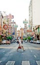 A man crossing yaowarat street Royalty Free Stock Photo