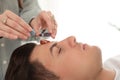 Man during crystal healing session in room Royalty Free Stock Photo