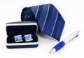 Man cuff links in box pen and tie Royalty Free Stock Photo