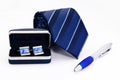 Man cuff links in box pen and tie isolated Royalty Free Stock Photo
