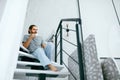 Man With Cup Of Coffee Reading Newspaper At Home Royalty Free Stock Photo