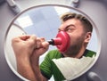 Man with cup plunger Royalty Free Stock Photo