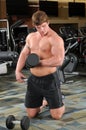 Man Curling Dumbbell