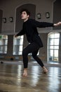 Man with curly hair dancing at gym Royalty Free Stock Photo