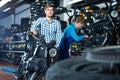 man customer buying motorcycle