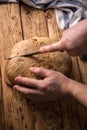 Man cuts bread Royalty Free Stock Photo