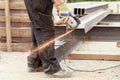 Man cuts flex steel products Royalty Free Stock Photo