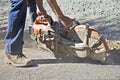 Man Cutting Asphalt