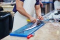 Man cutting Atlantic largehead hairtails on fish market Royalty Free Stock Photo