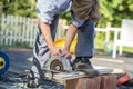 Man cutting boards with a circular saw Royalty Free Stock Photo