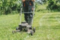 Man cutting grass with lawnmower Royalty Free Stock Photo