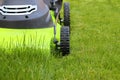 Man cutting the grass with lawn mower Royalty Free Stock Photo