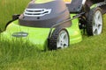 Man cutting the grass with lawn mower Royalty Free Stock Photo