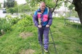 A man cutting grass to make nice lawn