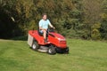 Man cutting his grass Royalty Free Stock Photo