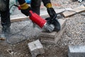 Man cutting light weigt cinder block with angel grinder Royalty Free Stock Photo