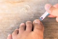 Man is cutting owner nails Royalty Free Stock Photo