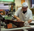 Man Cutting Presunto In Faro Portugal