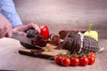 Man is cutting smoked meat Royalty Free Stock Photo