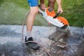 Man cutting stone tiles with a circular saw Royalty Free Stock Photo