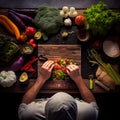 a man cutting up vegetables on a table