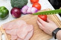 Man cutting vegetables.