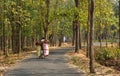 A man cycleing with laugage small rode on the jungle of Jhargram, a nature tourist spot in West Brnga , India