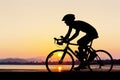 Man cycling at the beach twilight time Royalty Free Stock Photo