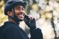 Man, cycling and phone call outdoor in nature for sports, exercise or training on a mountain bike. Athlete male person Royalty Free Stock Photo