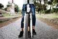 Man cycling by the Via Appia Antica in Rome, Italy