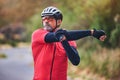 Man, cyclist and stretching arms on mountain in sports fitness, workout or outdoor exercise in nature. Active male Royalty Free Stock Photo