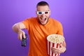 man in 3d glasses using console watching movie Royalty Free Stock Photo