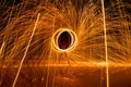 man dacing swing fire Show on the beach. Royalty Free Stock Photo