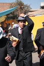 Man dancer with musical rattle at carnival in Bolivia