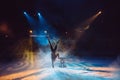 A man dancing in the circus arena