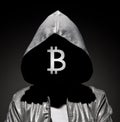Man in the hood with bitcoin logo