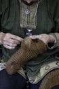 Man darning wool socks