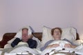 Man Dealing with Snoring Wife Royalty Free Stock Photo