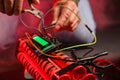 Man defusing bomb at table, closeup