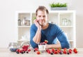 Man with delicious yogurt with fresh berries Royalty Free Stock Photo