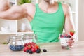 Man with delicious yogurt with fresh berries