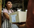 Man Deliver Mail Box to Woman in front of Stop Royalty Free Stock Photo