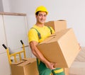 Man delivering boxes during house move Royalty Free Stock Photo