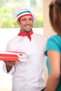 Man delivering fresh pizzas