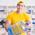 Man delivering water bottle to the office