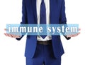 Man demonstrating text Immune System on white background, closeup