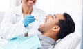 Man, dentist and check teeth with tools for dental cosmetics, healthcare assessment or medical consulting. Patient Royalty Free Stock Photo