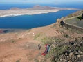 Man during departure with his parapent at Mirador del Rio on Lanzarote island in Spain