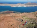 Man during departure with his parapent at Mirador del Rio on Lanzarote island in Spain