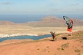 Man during departure with his parapent at Mirador del Rio on Lanzarote island in Spain